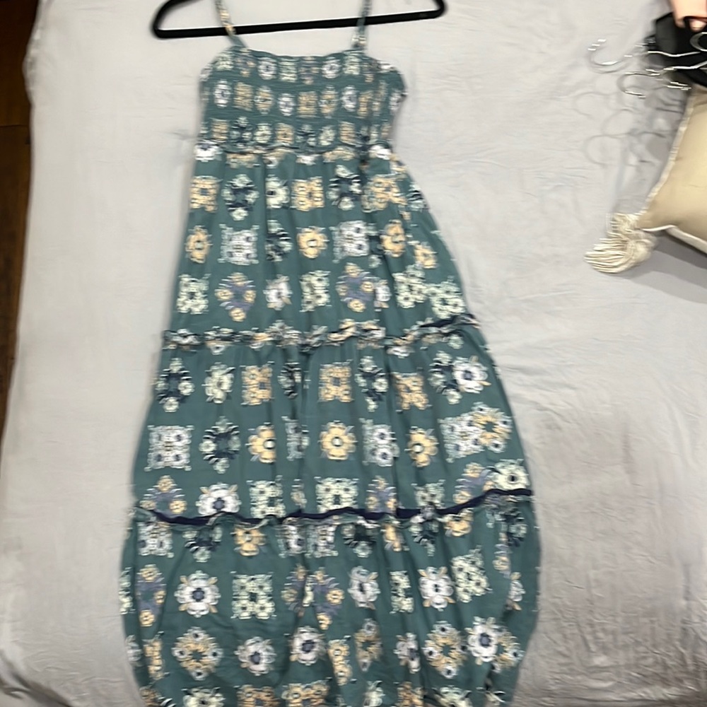 This dress is a very comfortable long classy apparel.
